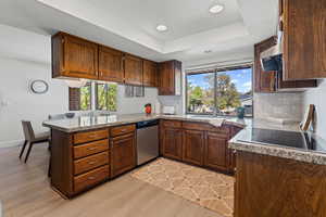 Kitchen with newer stainless steel appliances & granite countertops