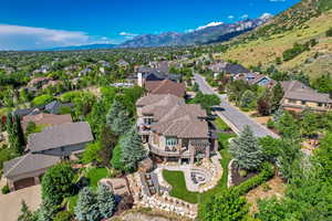 Aerial view of residential area featuring mountains