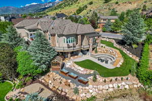 Aerial perspective of suburban area featuring a mountain backdrop