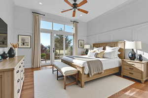 Virtually Staged - Bedroom featuring a ceiling fan, light wood-style floors, recessed lighting, and access to outside