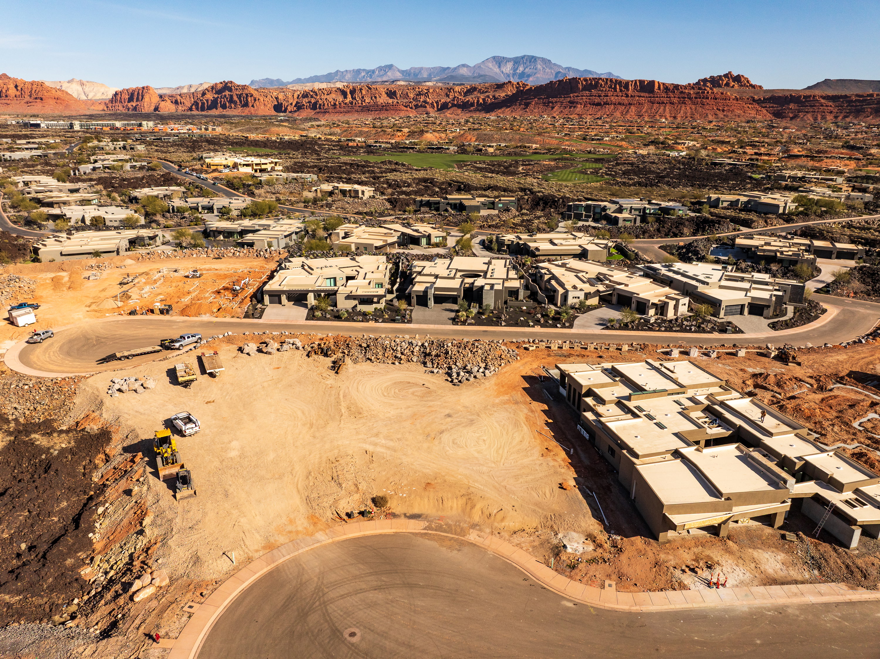 Aerial view of residential area featuring mountains