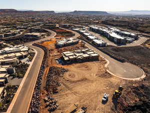 Aerial view of property and surrounding area with mountains