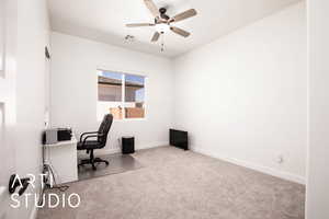 Office featuring carpet and ceiling fan