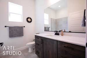 Bathroom featuring vanity and light tile patterned flooring