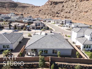 Aerial perspective of suburban area with a mountain backdrop
