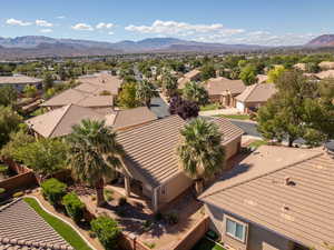 Aerial view of residential area featuring mountains
