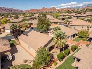 Aerial view of residential area with a mountain backdrop