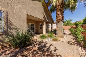View of side of property with stucco siding