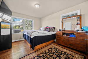 Bedroom featuring wood finished floors