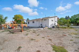 Back of property featuring a patio