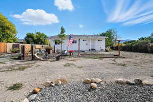 Back of property with a patio area