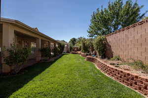 View of fenced backyard