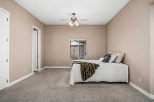 Bedroom featuring carpet flooring and ceiling fan