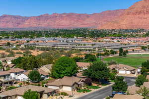 Aerial perspective of suburban area with mountains
