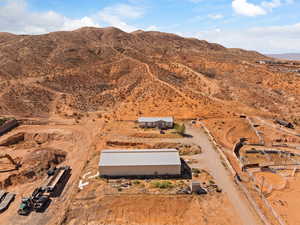 Aerial view of property's location with mountains and rural landscape