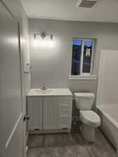 Full bathroom featuring vanity and shower / tub combination