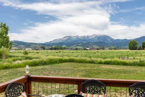 View of mountain background featuring rural landscape