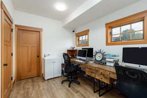 Office space featuring light wood finished floors