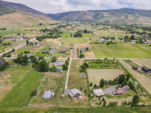 View of property location with a mountain backdrop and rural landscape