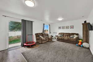 Living area with wood finished floors