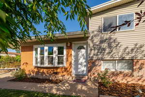 Property entrance with brick siding