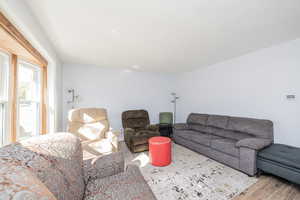 Living room featuring wood finished floors