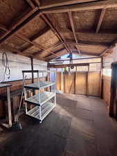 Miscellaneous room featuring lofted ceiling