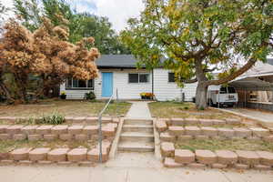 View of front of home with a carport
