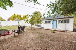 Fenced backyard featuring a patio