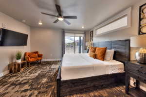 Bedroom featuring access to outside, ceiling fan, and recessed lighting