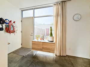 Doorway with concrete flooring