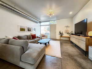 Living area with finished concrete flooring