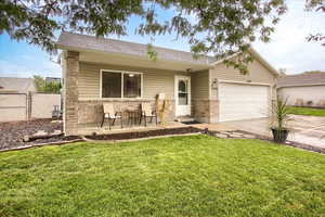 Single story home with brick siding, concrete driveway, roof with shingles, and a garage