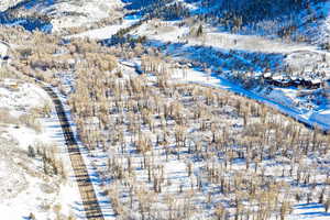 Snowy aerial view with a mountain view