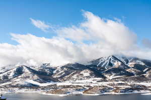 View of mountain backdrop with a nearby body of water