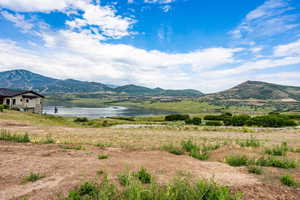 View of mountain backdrop with a large body of water