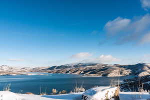 Mountain view featuring a large body of water