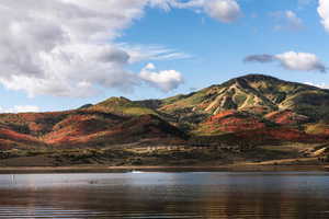 View of mountain background with a nearby body of water