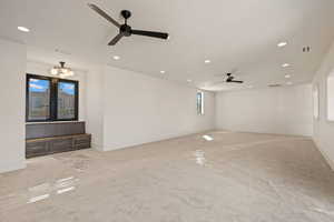 Unfurnished room featuring recessed lighting, a ceiling fan, and light colored carpet
