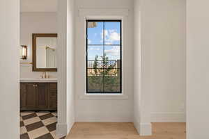 Full bath with vanity and a shower