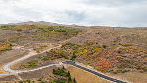 View of mountain background featuring rural landscape