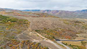 Aerial view of sparsely populated area with mountains