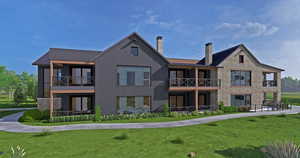 Rear view of house with a balcony, a chimney, stone siding, and a yard