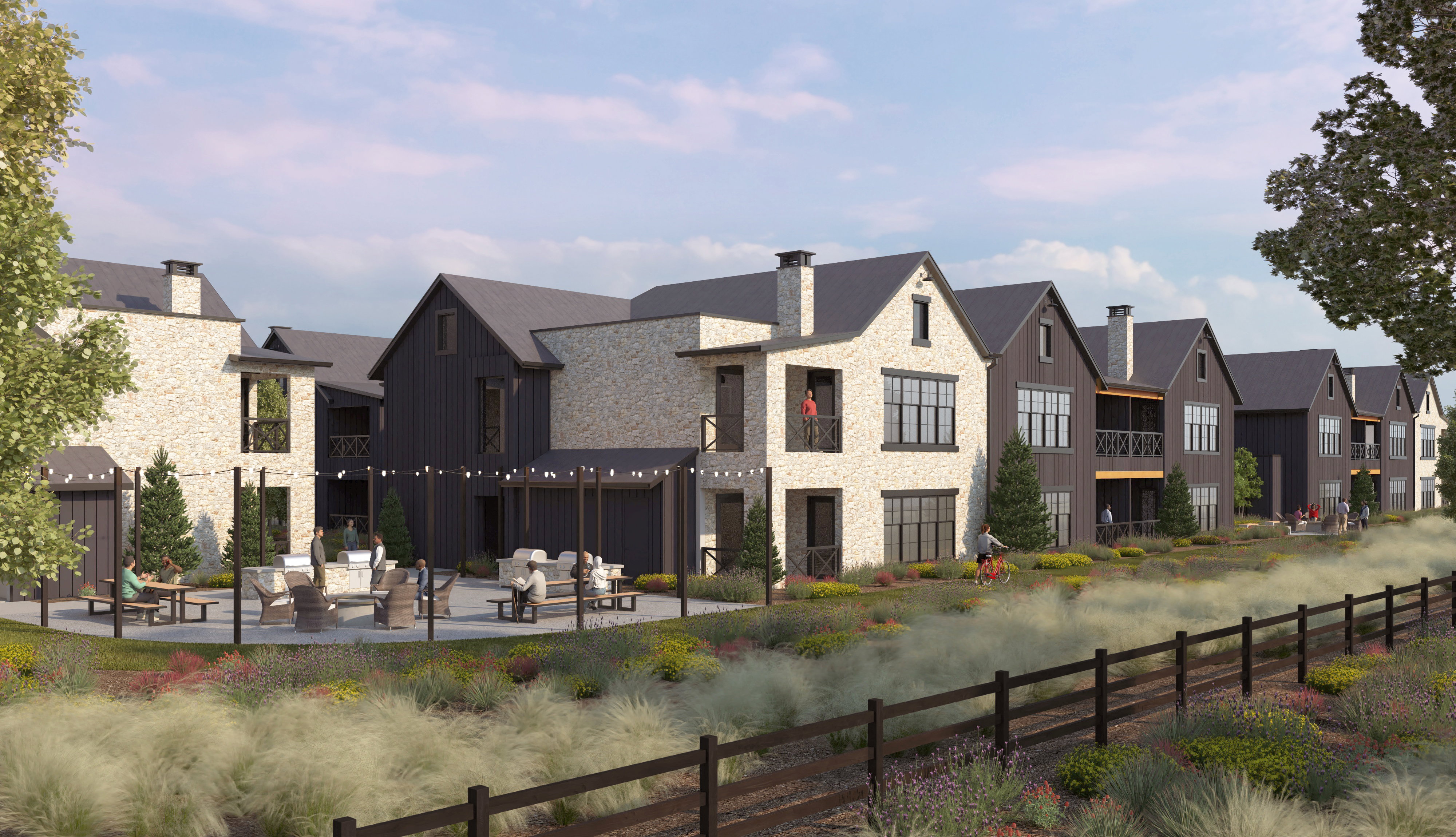 Back of house featuring stone siding, a residential view, a patio, and outdoor lounge area