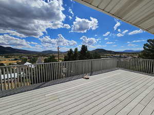 Wooden deck with a mountain view