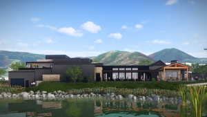 View of mountain backdrop with a large body of water