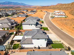 Aerial perspective of suburban area with mountains