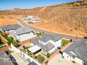 Aerial view of residential area featuring a mountain backdrop