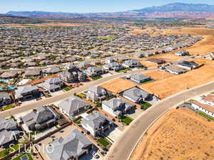 Aerial view of residential area with a mountainous background