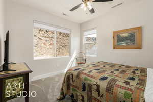 Bedroom featuring carpet floors and ceiling fan